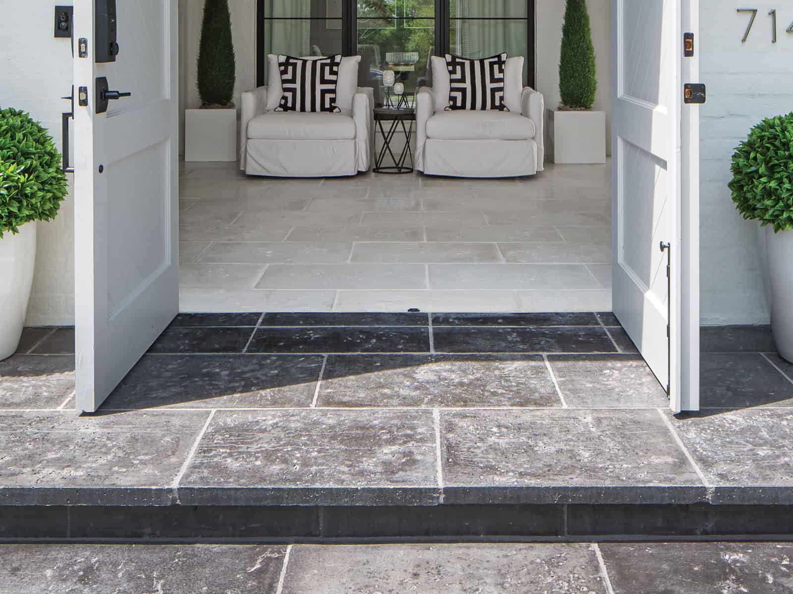 Layered Front Door Mats on Concrete Pavers - Transitional - Porch