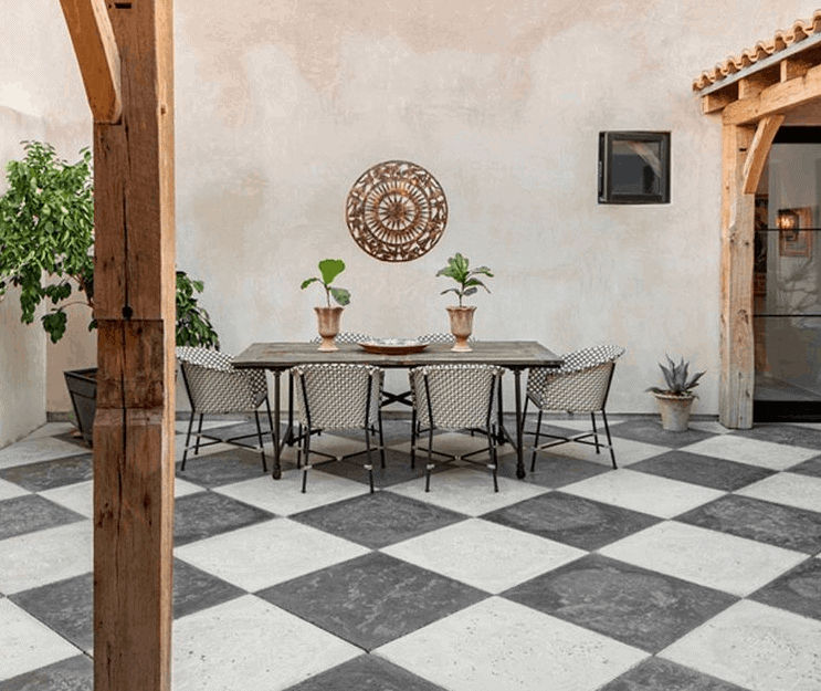Diagonal stacked bond checkboard concrete paver dining patio