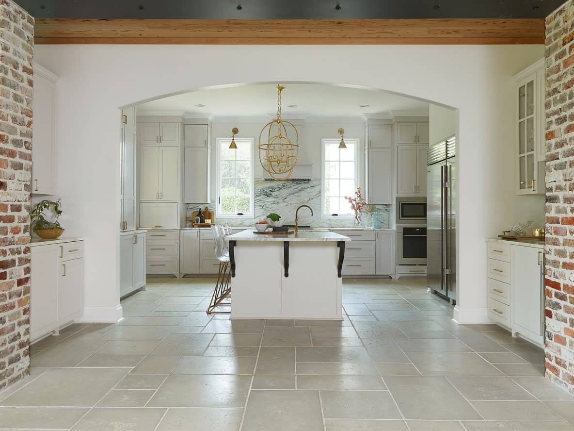 Oyster Peacock Pavers in a white open-plan kitchen