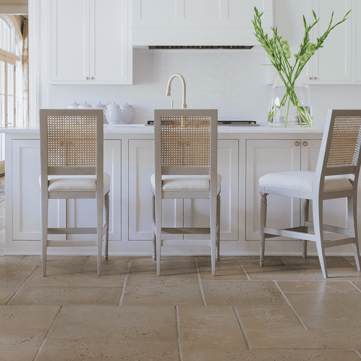 Buff pavers in a white kitchen
